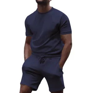 Detail view of men's navy blue casual short sleeve t-shirt and drawstring shorts set