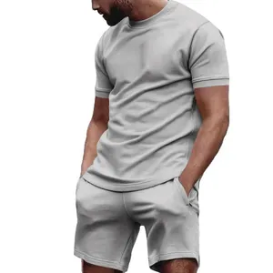Athletic men's casual light grey two-piece cotton blend t-shirt and shorts set for summer