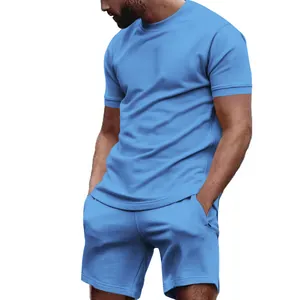Close-up of a men's light blue short sleeve t-shirt and casual sports shorts set