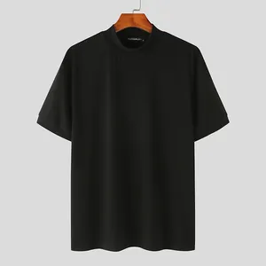 Close-up detail view of a minimalist black men's mock neck short sleeve casual T-shirt
