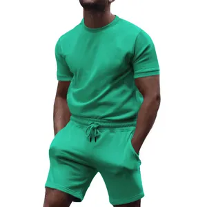 Men's two-piece casual sports set with turquoise t-shirt and matching shorts