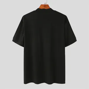 Detailed back view of a minimalist black mock neck short sleeve t-shirt for men