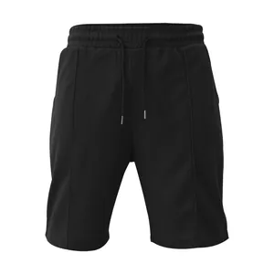 Vista frontale di pantaloncini neri in maglia a nido d'ape con vita con coulisse regolabile