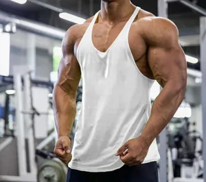 Detailed view of a white cotton gym stringer tank top on a muscular male athlete