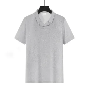 Detail view of grey waffle knit polo shirt featuring a stylish buck collar design