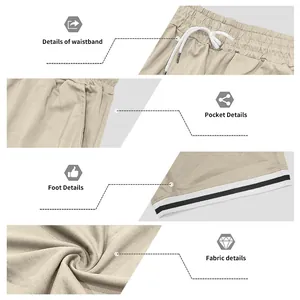 Dettagli dei pantaloncini sportivi kaki: vita con coulisse, tasche e bordo con strisce