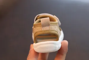 Detailed close-up view of the soft non-slip sole and heel of these toddler sandals