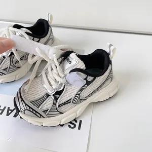 Silver toddler athletic sneakers with easy velcro strap and soft non-slip rubber sole