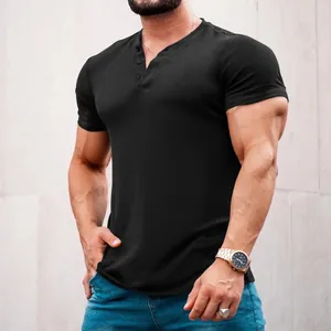 Detailed view of a black men's slim-fit Henley T-shirt with three-button placket