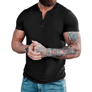 Detail shot of a black men's short-sleeve Henley shirt showing the button neckline