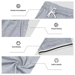 Dettaglio ravvicinato dei pantaloncini casual grigi da uomo che mostra vita e tessuto.