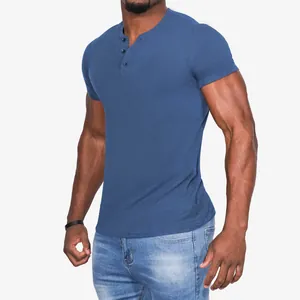 Side view of men's slim fit blue short sleeve Henley t-shirt with functional button placket