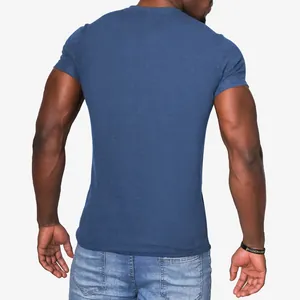 Back view of a men's slim fit short sleeve T-shirt in premium heather blue jersey fabric