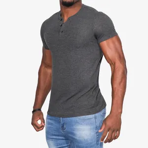 Detailed side view of a men's slim fit charcoal grey short sleeve Henley shirt with buttons