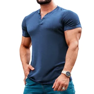 Casual men's solid blue short-sleeve Henley shirt for summer featuring button placket detail