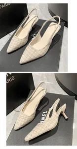 Close-up of elegant French style tweed slingback heels featuring a chic pointed toe design.