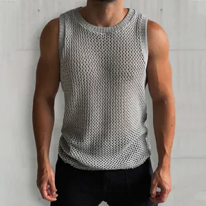 Detail view of grey hollow-out knitted sleeveless tank top showing texture and muscle fit