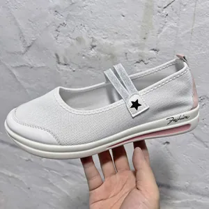 White breathable mesh Mary Jane flats with pink platform sole and straps