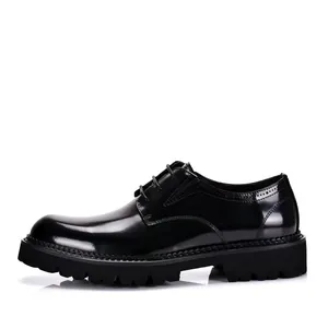 Detailed side view of men's black patent leather derby shoes with thick lug sole