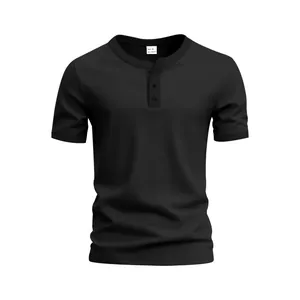 Detail shot of a black short sleeve Henley neck T-shirt with three-button placket.