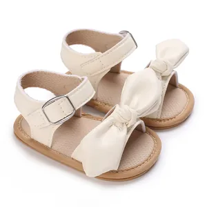 Entzückende cremefarbene Baby-Mädchen-Sandalen aus PU-Leder mit großem Schleifenmotiv