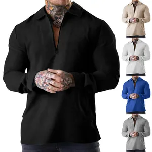 Waffle knit men's long-sleeve polo shirt with front zipper shown in multiple colors.