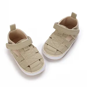 Khaki baby canvas sneakers with soft non-slip rubber soles and velcro straps