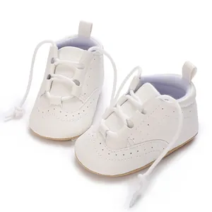 Classic white soft sole leather baby walking shoes with brogue detailing for infants 0-12M