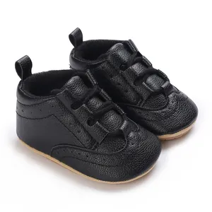Detailed view of black textured soft-sole baby walking sneakers for 0-1 years old.