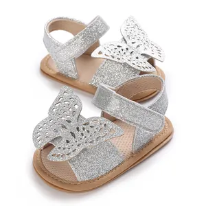Sparkling silver glitter baby girl sandals featuring a hollow butterfly design and soft sole