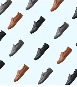 Variety of men's slip-on loafers in black, brown, and grey on a blue background.