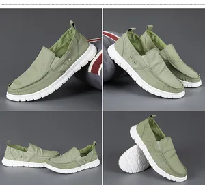 Detail view of light green slip-on men's loafers with white soft soles and breathable holes
