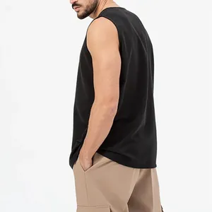 Detailed side view of a premium black men's cotton sleeveless vest in a loose casual fit