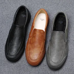 Men's slip-on loafers in black, brown, and grey with soft soles for casual business wear.