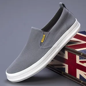 Men's breathable grey mesh slip-on loafers with stylish thick white soles for summer