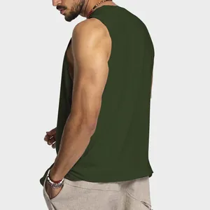Detail view of men's dark green loose cotton sleeveless tank top for summer sports.