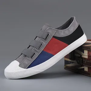 Stylish low-top canvas sneakers for men with breathable fabric and color-block design