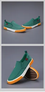 Detailansicht der grünen Herren-Freizeitschuhe mit rutschfester orangefarbener Sohle und Textur