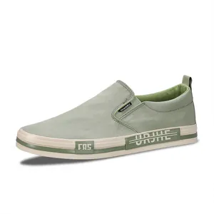 Comfortable men's sage green slip-on casual canvas sneakers with a durable flat sole