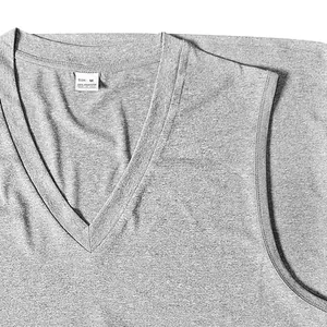 Detail view of men's grey V-neck vest showing the 100% polyester fabric texture