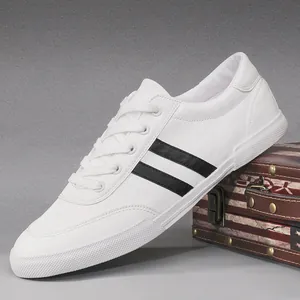 Stylish white men's low-top casual shoes with black stripes for autumn fashion