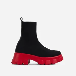 Women's breathable knit sock boots with chunky red platform sole side view