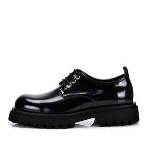 Side profile of men's chunky black leather Derby shoes with a stylish thick lug platform sole.
