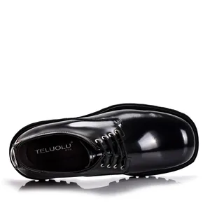Top-down detail view of shiny black leather men's Derby shoes with thick rubber lug soles.