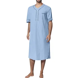 Traditional light blue men's short-sleeved thobe nightgown with black piping details.