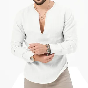 Close-up of white linen long-sleeve shirt featuring a deep V-neck and breathable fabric