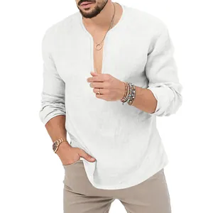 Detail of men's white linen long-sleeve Henley shirt showing the V-neck and texture.