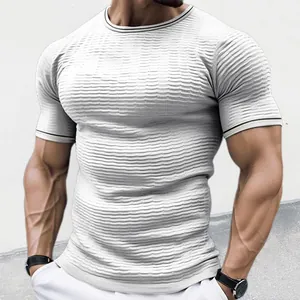 Detailed view of white slim fit knitted T-shirt with horizontal wave texture and piping.