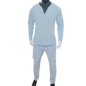Men's minimalist light blue long sleeve linen Henley shirt and pants set for casual wear