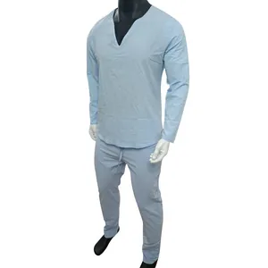 Light blue men's Henley linen set featuring deep V-neck long-sleeve top and slim pants